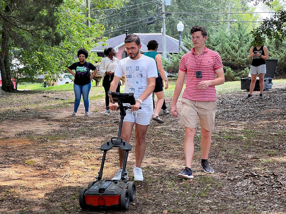 A student uses ground-penetrating RADAR